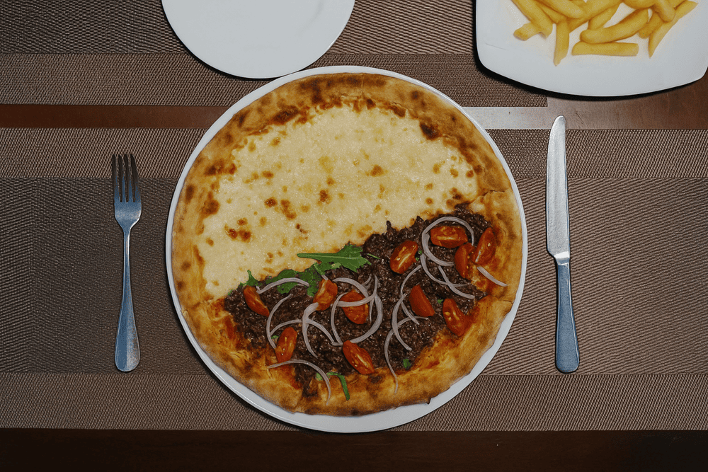 Pizza Parma Tay Ho offers a refined yet inviting Italian dining experience with a view of West Lake